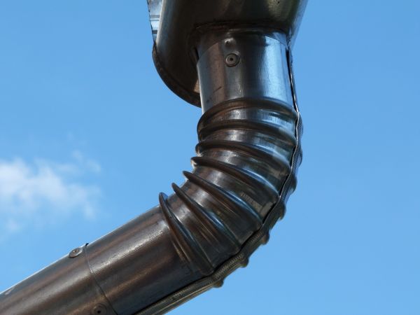 Metal Downspout Installation in Flint