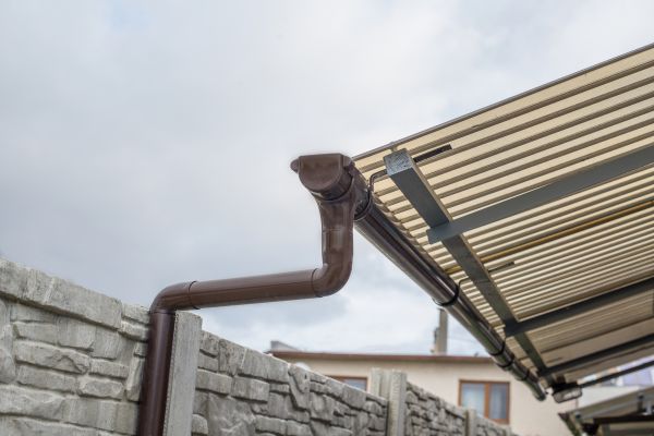 Plastic Downspout Installation in Flint